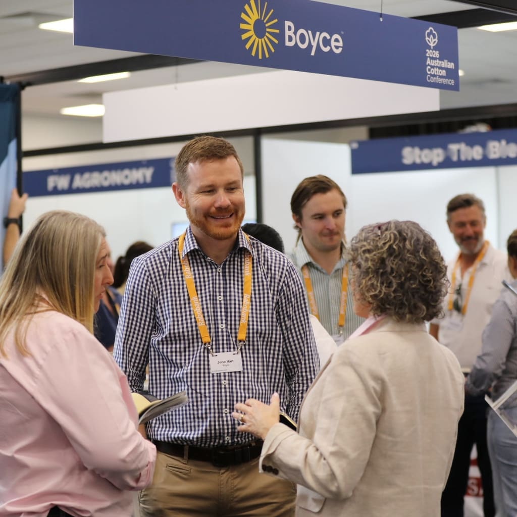 Image of Jono Hart at Conference speaking to people